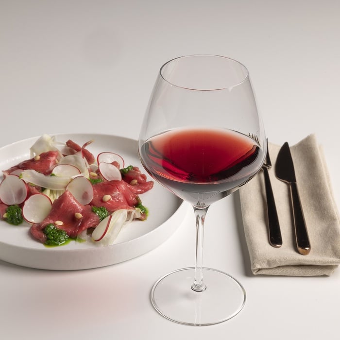 Beef carpaccio, crunchy fennel and rocket pesto