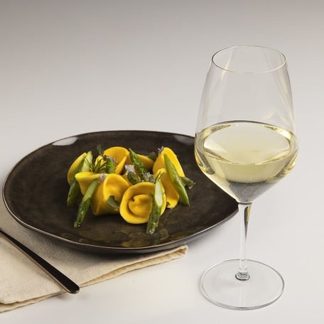 Tortelli with robiola and orange, herbed butter and asparagus