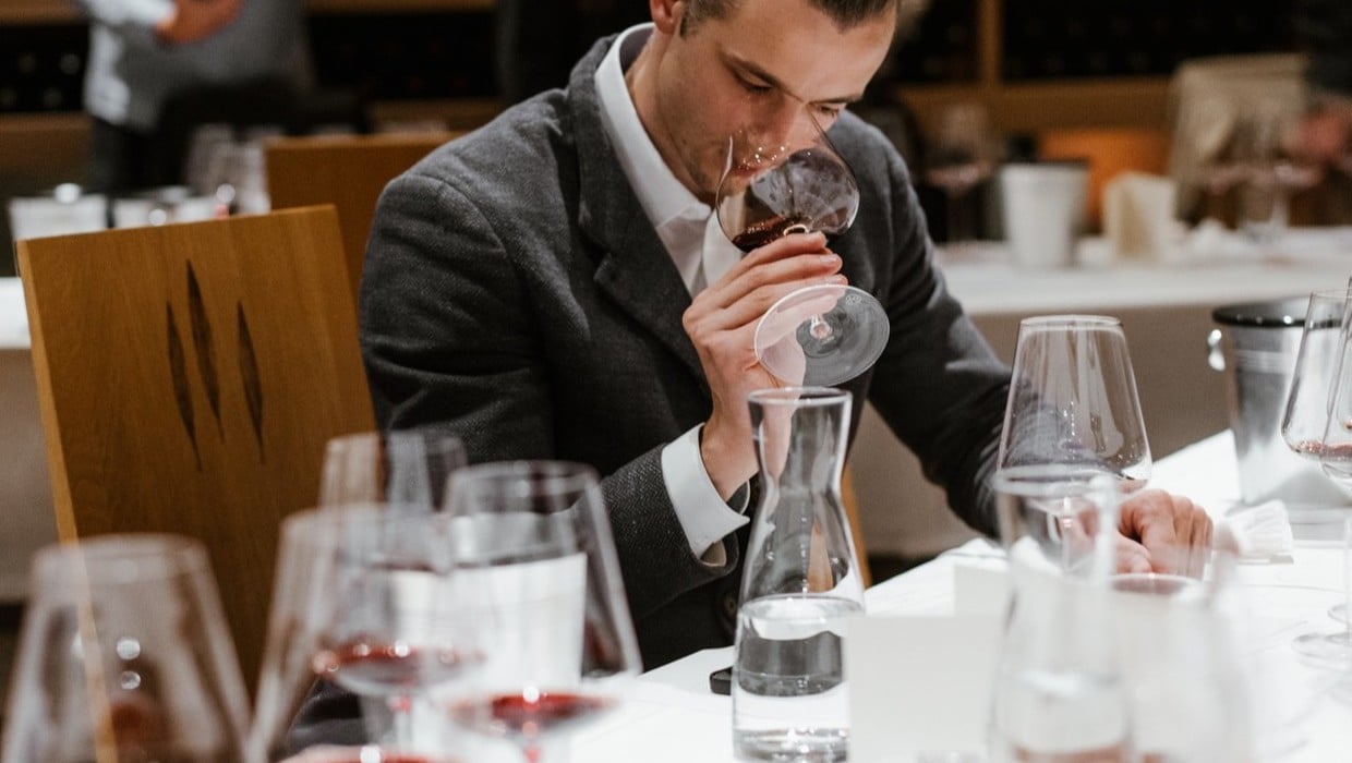 Bastian Winkler in his element tasting different wines.